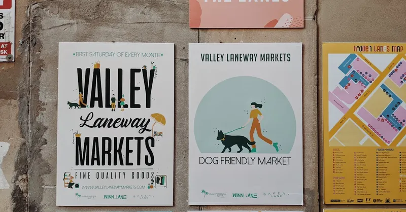 Promotional posters for Valley Laneway Markets in Brisbane showcasing event details and vibrant illustrations.